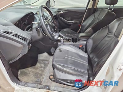 Zdjęcie 7 z 11 samochodu: 2012 FORD FOCUS TITANIUM VIN:1FAHP3N25CL144954 - miniatura