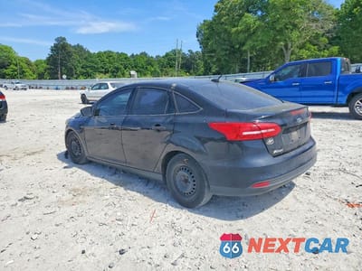 Trzecie zdjęcie samochodu z tyłu: 2018 FORD FOCUS S VIN:1FADP3E21JL299044 - miniatura