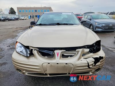 Piąte zdjęcie samochodu w środku: 2001 PONTIAC GRAND AM SE1 VIN:1G2NF52E51C117278 - miniatura