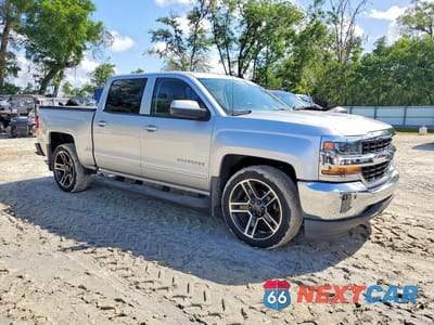 Czwarte zdjęcie samochodu z boku: 2018 CHEVROLET SILVERADO C1500 LT VIN:3GCPCREC7JG273916 - miniatura