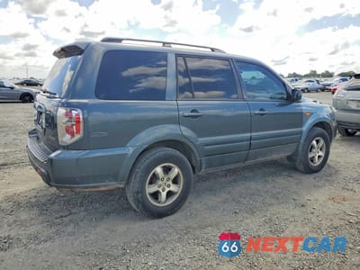 Trzecie zdjęcie samochodu z tyłu: 2006 HONDA PILOT EX VIN:2HKYF18716H553678 - miniatura