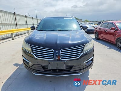 Piąte zdjęcie samochodu w środku: 2016 LINCOLN MKC PREMIERE VIN:5LMCJ1C99GUJ03584 - miniatura