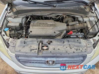 Zdjęcie 12 z 13 samochodu: 2003 HONDA PILOT EXL VIN:2HKYF18523H513071 - miniatura