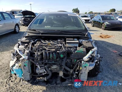 Piąte zdjęcie samochodu w środku: 2022 TOYOTA COROLLA SE VIN:JTDS4MCE2N3513817 - miniatura