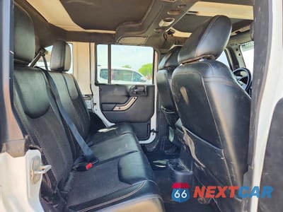 Zdjęcie 11 z 14 samochodu: 2016 JEEP WRANGLER UNLIMITED SAHARA VIN:1C4BJWEG2GL338183 - miniatura