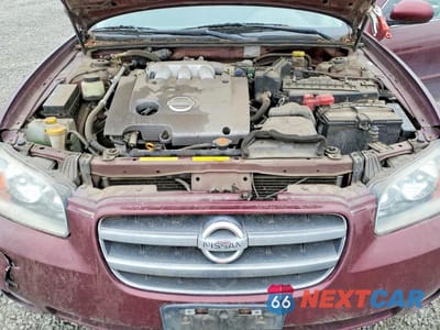 Zdjęcie 11 z 12 samochodu: 2002 NISSAN MAXIMA GXE VIN:JN1DA31D02T443593 - miniatura