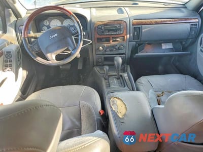 Zdjęcie 8 z 13 samochodu: 2003 JEEP GRAND CHEROKEE OVERLAND VIN:1J8GW68J93C532310 - miniatura