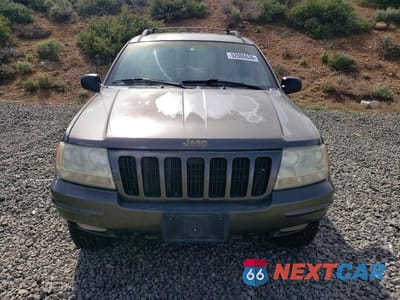 Piąte zdjęcie samochodu w środku: 1999 JEEP GRAND CHEROKEE LIMITED VIN:1J4GW68N2XC677361 - miniatura