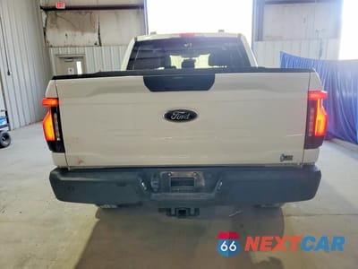 Zdjęcie 6 z 12 samochodu: 2022 FORD F150 LIGHTNING PRO VIN:1FTVW1EL4NWG04894 - miniatura