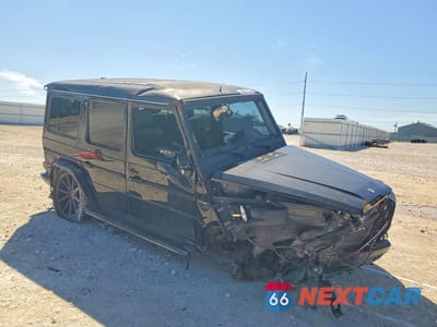 Czwarte zdjęcie samochodu z boku: 2011 MERCEDES-BENZ G 55 AMG VIN:WDCYC7BF1BX186754 - miniatura