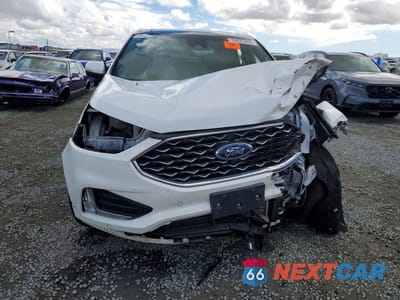 Piąte zdjęcie samochodu w środku: 2022 FORD EDGE TITANIUM VIN:2FMPK4K91NBB01884 - miniatura