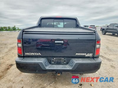 Zdjęcie 6 z 12 samochodu: 2013 HONDA RIDGELINE SPORT VIN:5FPYK1F75DB018869 - miniatura