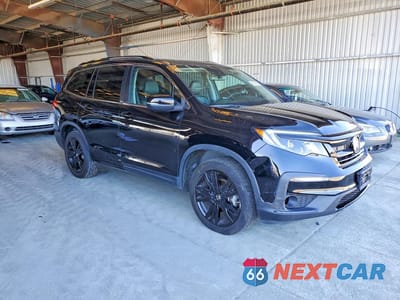 Czwarte zdjęcie samochodu z boku: 2022 HONDA PILOT SE VIN:5FNYF6H27NB072395 - miniatura