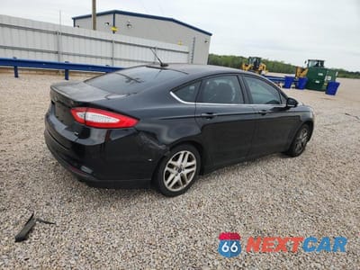 Trzecie zdjęcie samochodu z tyłu: 2014 FORD FUSION SE VIN:1FA6P0H76E5372823 - miniatura