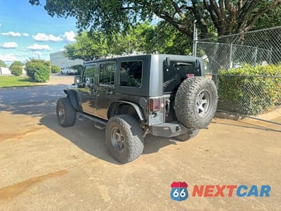Trzecie zdjęcie samochodu z tyłu: 2014 JEEP WRANGLER UNLIMITED SPORT VIN:1C4BJWDG2EL244139 - miniatura