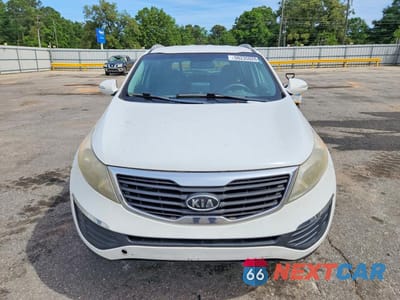 Piąte zdjęcie samochodu w środku: 2011 KIA SPORTAGE LX VIN:KNDPB3A27B7024266 - miniatura