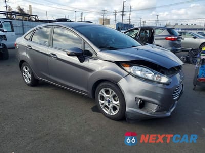Czwarte zdjęcie samochodu z boku: 2014 FORD FIESTA SE VIN:3FADP4BJXEM190233 - miniatura