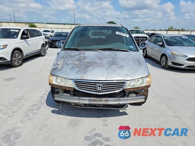 Piąte zdjęcie samochodu w środku: 2000 HONDA ODYSSEY VIN:2HKRL1851YH548754 - miniatura