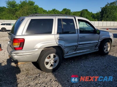 Trzecie zdjęcie samochodu z tyłu: 2003 JEEP GRAND CHEROKEE OVERLAND VIN:1J8GW68J93C532310 - miniatura