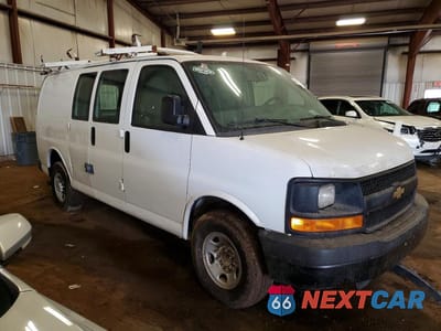 Czwarte zdjęcie samochodu z boku: 2014 CHEV EXPRESS G2500 VIN:1GCWGFCA9E1100337 - miniatura