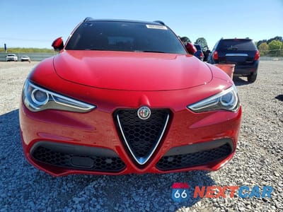 Piąte zdjęcie samochodu w środku: 2022 ALFA ROMEO STELVIO TI VIN:ZASPAKBN7N7D47332 - miniatura