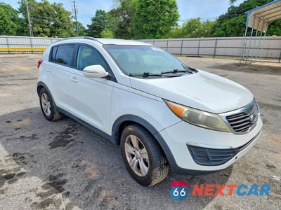 Czwarte zdjęcie samochodu z boku: 2011 KIA SPORTAGE LX VIN:KNDPB3A27B7024266 - miniatura