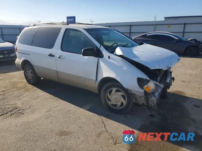 Czwarte zdjęcie samochodu z boku: 1999 TOYOTA SIENNA LE VIN:4T3ZF13C3XU145671 - miniatura
