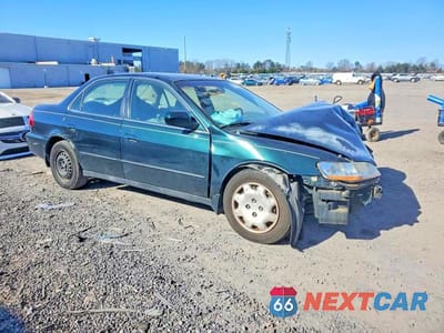Czwarte zdjęcie samochodu z boku: 1999 HONDA ACCORD LX VIN:1HGCG5547XA052636 - miniatura