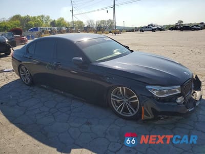 Czwarte zdjęcie samochodu z boku: 2017 BMW 750 XI VIN:WBA7F2C52HG421718 - miniatura