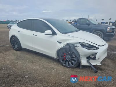 Czwarte zdjęcie samochodu z boku: 2022 TESLA MODEL Y VIN:7SAYGDEF6NF459712 - miniatura