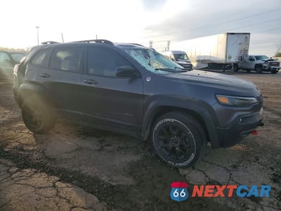 Czwarte zdjęcie samochodu z boku: 2022 JEEP CHEROKEE TRAILHAWK VIN:1C4PJMBX6ND541891 - miniatura