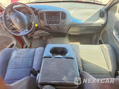 Zdjęcie 8 z 12 samochodu: 2003 FORD F150 VIN:1FTRX07243KC92609 - miniatura