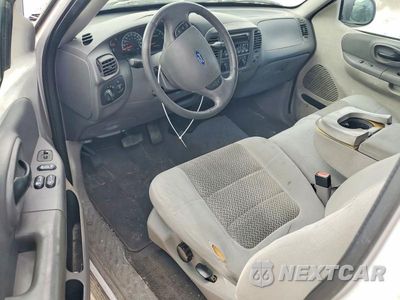 Zdjęcie 9 z 13 samochodu: 2003 FORD F150 VIN:1FTRF17223NA53972 - miniatura