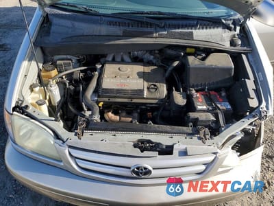 Zdjęcie 12 z 14 samochodu: 2002 TOYOTA SIENNA XLE VIN:4T3ZF13CX2U488633 - miniatura