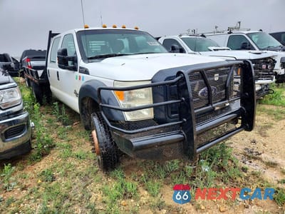 Czwarte zdjęcie samochodu z boku: 2015 FORD F450 SUPER DUTY FLATBED TRUCK VIN:1FD0W4HTXFEA47192 - miniatura