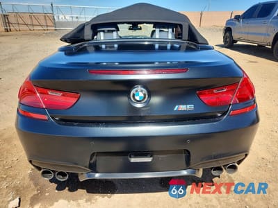 Zdjęcie 6 z 12 samochodu: 2017 BMW M6 VIN:WBS6G9C51HD932299 - miniatura