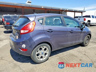 Trzecie zdjęcie samochodu z tyłu: 2013 FORD FIESTA VIN:3FADP4FJXDM144295 - miniatura