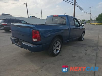Czwarte zdjęcie samochodu z boku: 2012 DODGE RAM 1500 SLT VIN:1C6RD6GT4CS268922 - miniatura