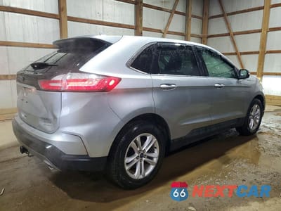 Trzecie zdjęcie samochodu z tyłu: 2020 FORD EDGE SEL VIN:2FMPK4J92LBA41886 - miniatura