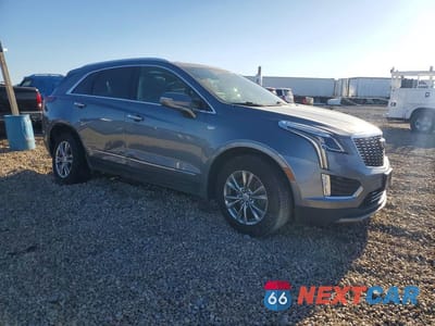 Czwarte zdjęcie samochodu z boku: 2021 CADILLAC XT5 PREMIUM LUXURY VIN:1GYKNDRS7MZ103742 - miniatura