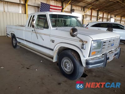 Czwarte zdjęcie samochodu z boku: 1986 FORD F250 VIN:1FTHX2518GKA61770 - miniatura