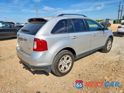 Trzecie zdjęcie samochodu z tyłu: 2012 FORD EDGE SEL VIN:2FMDK4JC8CBA39087 - miniatura