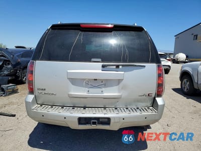 Zdjęcie 6 z 13 samochodu: 2010 GMC YUKON DENALI VIN:1GKUKEEF0AR236011 - miniatura