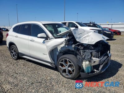 Czwarte zdjęcie samochodu z boku: 2018 BMW X1 SDRIVE28I VIN:WBXHU7C34J5H40120 - miniatura