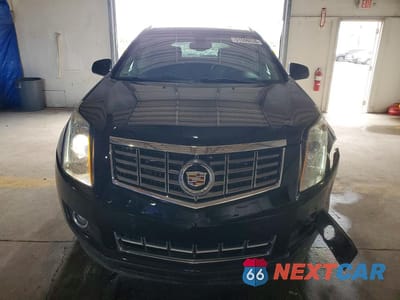 Piąte zdjęcie samochodu w środku: 2016 CADILLAC SRX PERFORMANCE COLLECTION VIN:3GYFNCE37GS569800 - miniatura