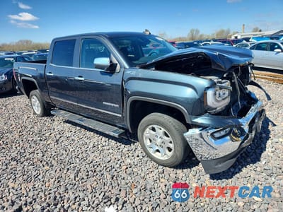 Czwarte zdjęcie samochodu z boku: 2018 GMC SIERRA K1500 SLT VIN:3GTU2NEC2JG368267 - miniatura
