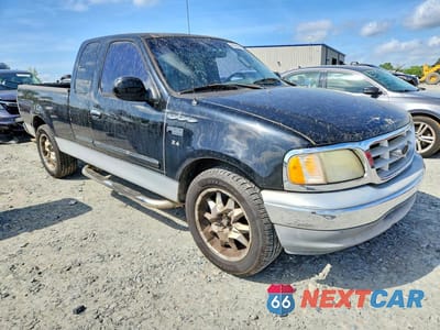 Czwarte zdjęcie samochodu z boku: 2002 FORD F150 VIN:1FTRX17282NC03367 - miniatura