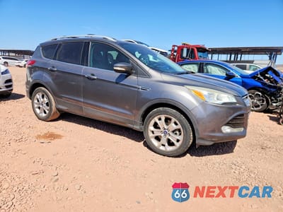 Czwarte zdjęcie samochodu z boku: 2014 FORD ESCAPE TITANIUM VIN:1FMCU9JX8EUA77258 - miniatura