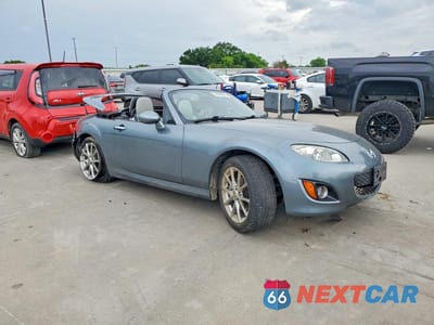 Czwarte zdjęcie samochodu z boku: 2011 MAZDA MX-5 MIATA VIN:JM1NC2PF8B0217074 - miniatura