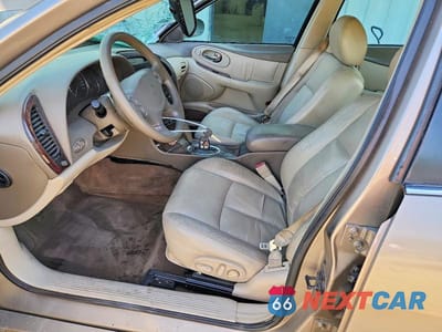 Zdjęcie 7 z 12 samochodu: 2002 OLDSMOBILE AURORA VIN:1G3GR64H124245103 - miniatura